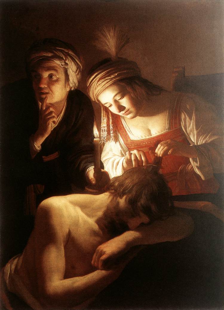 Honthorst's candlelit painting of Delilah cutting the hair of the sleeping Samson
